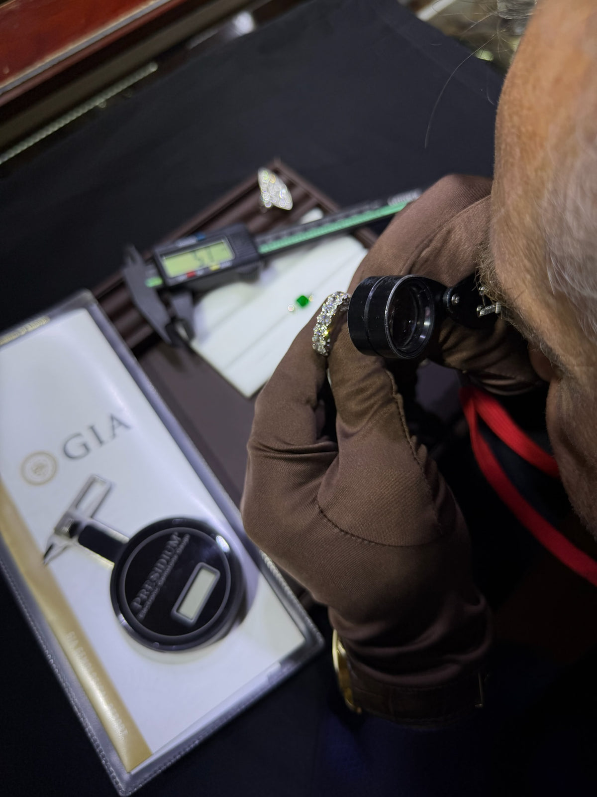 Konstantin Kupfer inspecting a ring in the workshop